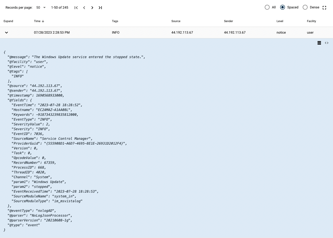 Expanded event record with the angle-bracket control that reveals the raw syslog