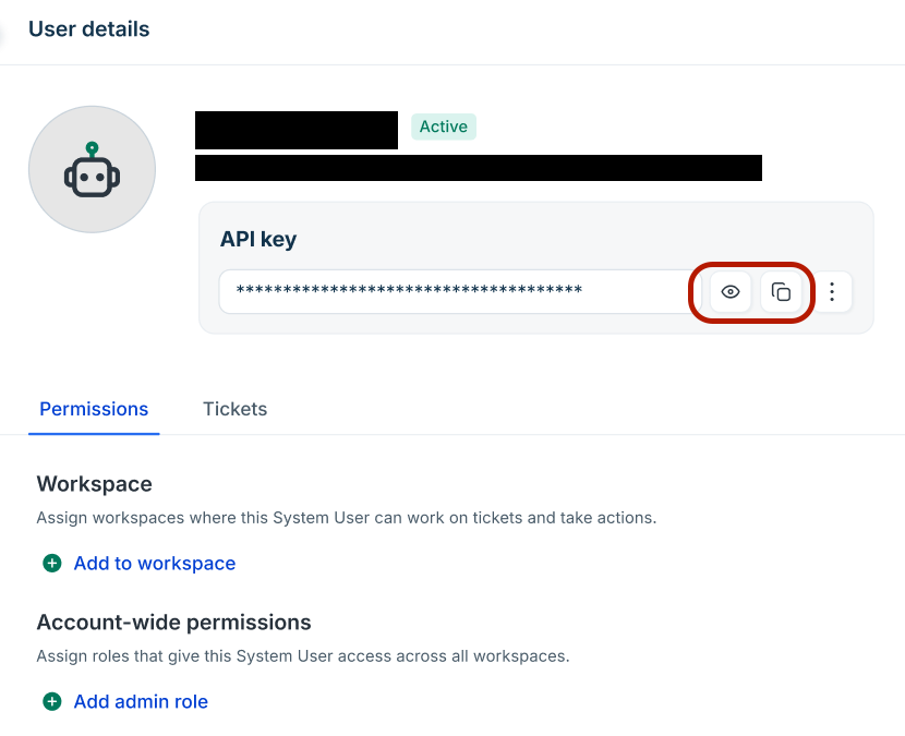 Integration user details page with the masked API key card, the Show and Copy icons highlighted, and the Permissions tab below