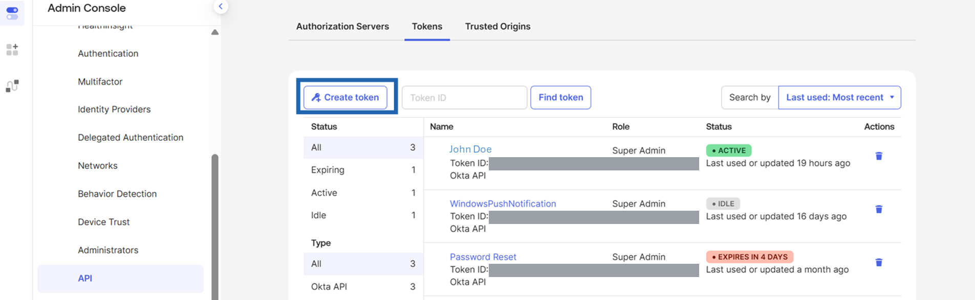 Okta Admin Console API page, Tokens tab, with the Create token button and the token list showing status badges
