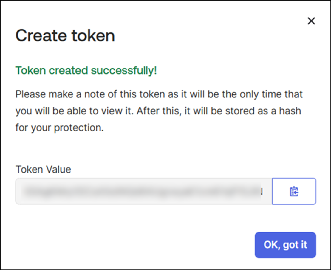 Token created successfully dialog with the Token Value field and a copy-to-clipboard button
