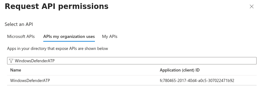 Request API permissions dialog on the APIs my organization uses tab, filtered to WindowsDefenderATP, showing one result with application ID fc780465-2017-40d4-a0c5-307022471b92